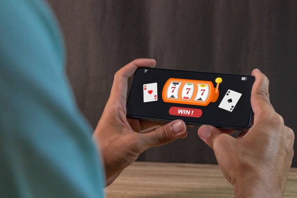 Mobile phone displaying live World Cup match and baccarat table side-by-side on kepiting togel